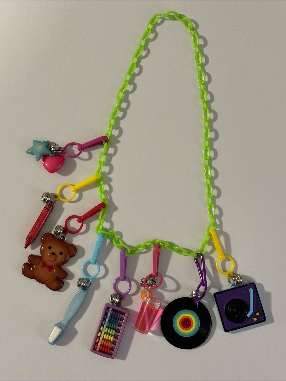 Michaels Retro 80’s Reproduction Flash Charm Necklace – 8 Charms Included